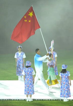 (261004) -- NAGOYA, Oct. 4, 2026 -- Flag-bearer of the delegation of China Bi Kun parades into the stadium during the closing ceremony of the 20th Asian Games Aichi-Nagoya 2026 in Nagoya, Japan, Oct. 4, 2026. ) (SP)JAPAN-NAGOYA-ASIAN GAMES-CLOSING CEREMONY JiaxYuchen