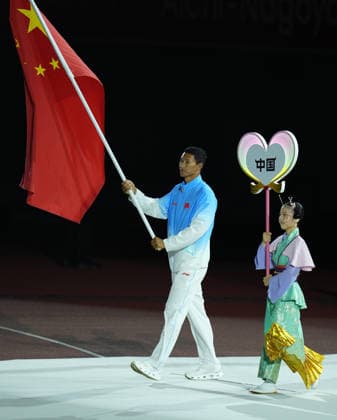 (261004) -- NAGOYA, Oct. 4, 2026 -- Flag-bearer of the delegation of China Bi Kun parades into the stadium during the closing ceremony of the 20th Asian Games Aichi-Nagoya 2026 in Nagoya, Japan, Oct. 4, 2026. ) (SP)JAPAN-NAGOYA-ASIAN GAMES-CLOSING CEREMONY WangxFei