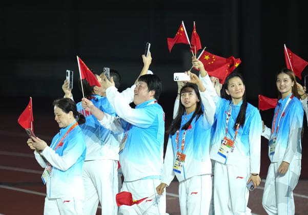 (261004) -- NAGOYA, Oct. 4, 2026 -- The delegation of China parade into the stadium during the closing ceremony of the 20th Asian Games Aichi-Nagoya 2026 in Nagoya, Japan, Oct. 4, 2026. ) (SP)JAPAN-NAGOYA-ASIAN GAMES-CLOSING CEREMONY WangxFei