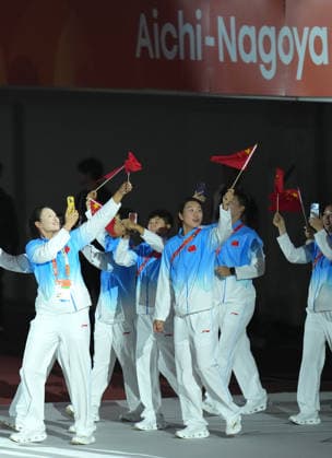 (261004) -- NAGOYA, Oct. 4, 2026 -- The delegation of China parade into the stadium during the closing ceremony of the 20th Asian Games Aichi-Nagoya 2026 in Nagoya, Japan, Oct. 4, 2026. ) (SP)JAPAN-NAGOYA-ASIAN GAMES-CLOSING CEREMONY WangxFei