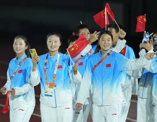 (261004) -- NAGOYA, Oct. 4, 2026 -- The delegation of China parade into the stadium during the closing ceremony of the 20th Asian Games Aichi-Nagoya 2026 in Nagoya, Japan, Oct. 4, 2026. ) (SP)JAPAN-NAGOYA-ASIAN GAMES-CLOSING CEREMONY WangxFei