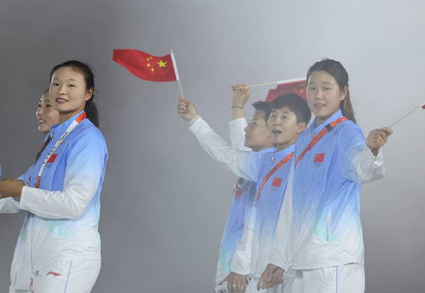 (261004) -- NAGOYA, Oct. 4, 2026 -- Delegation of China parade into the stadium during the closing ceremony of the 20th Asian Games Aichi-Nagoya 2026 in Nagoya, Japan, Oct. 4, 2026. ) (SP)JAPAN-NAGOYA-ASIAN GAMES-CLOSING CEREMONY JiaxHaocheng
