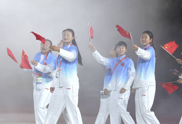 (261004) -- NAGOYA, Oct. 4, 2026 -- Delegation of China parade into the stadium during the closing ceremony of the 20th Asian Games Aichi-Nagoya 2026 in Nagoya, Japan, Oct. 4, 2026. ) (SP)JAPAN-NAGOYA-ASIAN GAMES-CLOSING CEREMONY JiaxHaocheng