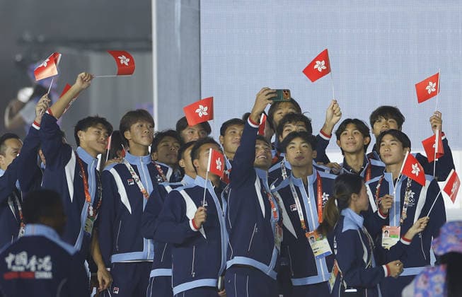 (261004) -- NAGOYA, Oct. 4, 2026 -- The delegation of Hong Kong of China parade into the stadium during the closing ceremony of the 20th Asian Games Aichi-Nagoya 2026 in Nagoya, Japan, Oct. 4, 2026. ) (SP)JAPAN-NAGOYA-ASIAN GAMES-CLOSING CEREMONY WuxZhizun 