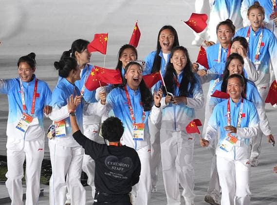(261004) -- NAGOYA, Oct. 4, 2026 -- Delegation of China parade into the stadium during the closing ceremony of the 20th Asian Games Aichi-Nagoya 2026 in Nagoya, Japan, Oct. 4, 2026. ) (SP)JAPAN-NAGOYA-ASIAN GAMES-CLOSING CEREMONY LuoxYuan