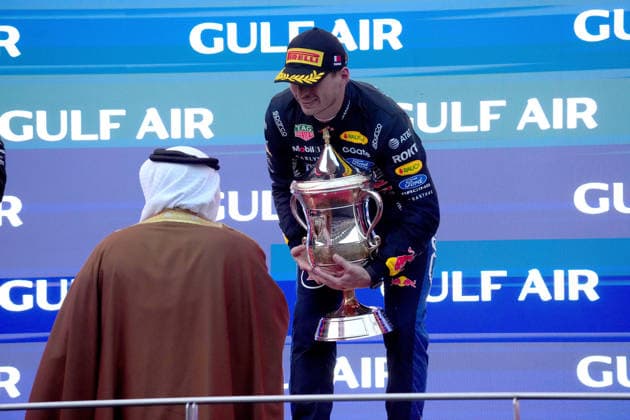 2026 Formula 1 Gulf Air Bahrain Grand Prix, October 4, 2026, Sepang International Circuit, Kuala Lumpur, 2026 Formula 1 Gulf Air Bahrain Grand Prix, Podium, Prince Hamad bin Isa Al Khalifa of Bahrain presents the trophy to the winner, Max Verstappen (NLD) of Oracle Red Bull Racing, at the Sepang International Circuit in Kuala Lumpur, Malaysia Copyright: xNordphotox xBraticx