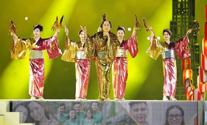 Aichi-Nagoya Asian Games: Closing ceremony Japanese actor Ken Matsudaira (C) performs Matsuken Samba II dance during the closing ceremony of the Aichi-Nagoya Asian Games at Mizuho Park Athletic Stadium in Nagoya, central Japan, on Oct. 4, 2026. A14AA0005630041P