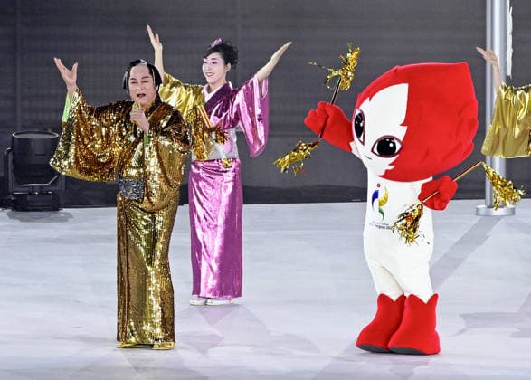 Aichi-Nagoya Asian Games: Closing ceremony Japanese actor Ken Matsudaira (L) performs Matsuken Samba II dance during the closing ceremony of the Aichi-Nagoya Asian Games at Mizuho Park Athletic Stadium in Nagoya, central Japan, on Oct. 4, 2026. A14AA0005630044P