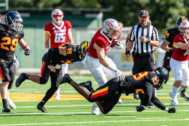 AMERICAN FOOTBALL - IFAF EC, AUT vs BEL SALZBURG,AUSTRIA,04.OCT.26 - AMERICAN FOOTBALL - IFAF European Championship, EM, Europameisterschaft Austria vs Belgium. Image shows Lukas Kalkhofer (AUT) and Stef Atidzah (BEL).  GEPAxpictures xJulioxArellano