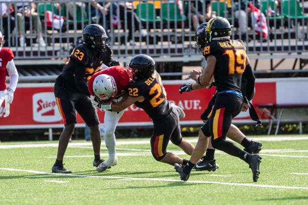AMERICAN FOOTBALL - IFAF EC, AUT vs BEL SALZBURG,AUSTRIA,04.OCT.26 - AMERICAN FOOTBALL - IFAF European Championship, EM, Europameisterschaft Austria vs Belgium. Image shows Stef Atidzah, Jorik Visser (BEL) and Daniel Holzmann (AUT).  GEPAxpictures xJulioxArellano