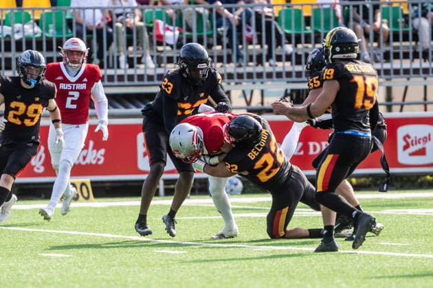 AMERICAN FOOTBALL - IFAF EC, AUT vs BEL SALZBURG,AUSTRIA,04.OCT.26 - AMERICAN FOOTBALL - IFAF European Championship, EM, Europameisterschaft Austria vs Belgium. Image shows Stef Atidzah, Jorik Visser (BEL) and Daniel Holzmann (AUT).  GEPAxpictures xJulioxArellano