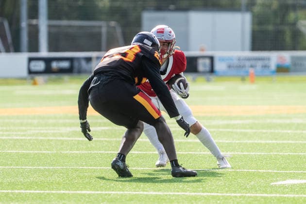 AMERICAN FOOTBALL - IFAF EC, AUT vs BEL SALZBURG,AUSTRIA,04.OCT.26 - AMERICAN FOOTBALL - IFAF European Championship, EM, Europameisterschaft Austria vs Belgium. Image shows Stef Atidzah (BEL) and Jonas Dachs-Wiesinger (AUT).  GEPAxpictures xJulioxArellano