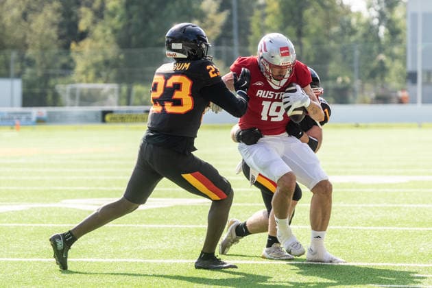 AMERICAN FOOTBALL - IFAF EC, AUT vs BEL SALZBURG,AUSTRIA,04.OCT.26 - AMERICAN FOOTBALL - IFAF European Championship, EM, Europameisterschaft Austria vs Belgium. Image shows Stef Atidzah (BEL) and Philipp Klar (AUT).  GEPAxpictures xJulioxArellano