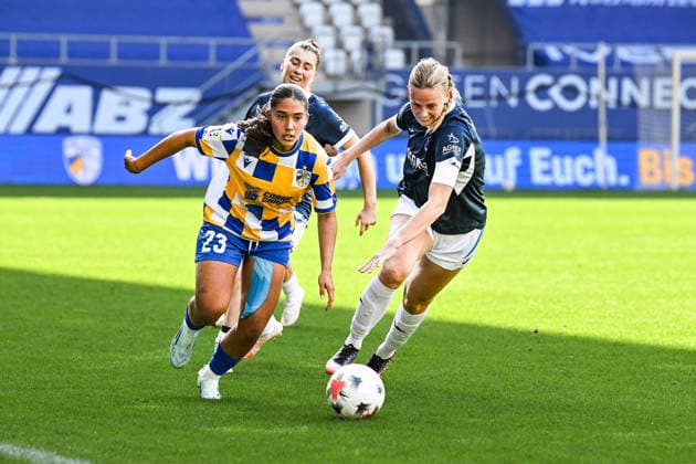 Soccer I Women I 2026–2027 Season I 2. Bundesliga I Matchday 8 I FC Carl Zeiss Jena vs. SC Sand I October 4, 2026, tackle by Paula Rintzner (23), FC Carl Zeiss Jena, Milena Fischer 6, SC Sand Jena, Ernst Abbe Sportfeld, ad hoc Arena, Thuringia, Germany Copyright: xLobeca InesxHähnelx