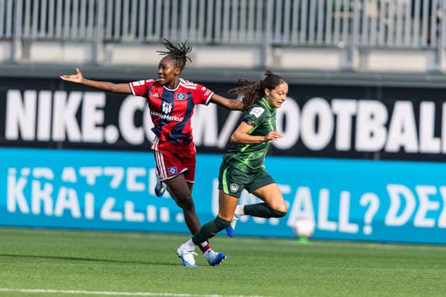 Soccer I Women s I 2026–2027 Season I Bundesliga I VfL Wolfsburg vs. Hamburger SV I October 4, 2026 Magou Doucoure 2, Hamburger SV, and Kessya Bussy 19, VfL Wolfsburg in a tackle—action, dynamism—Wolfsburg, AOK Stadium, Lower Saxony, Germany Copyright: xLobeca CedricxSiefkerx