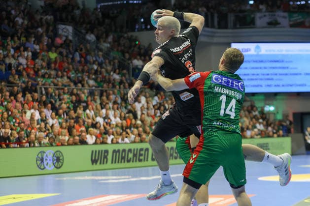 October 4, 2026, xtgx, Opel HBL Handball, SC Magdeburg vs. HC Erlangen emspor, from left: Lars Genz (Erlangen), 3, Omar Ingi Magnusson (Magdeburg), 14; duel, battle, tackle (Magdeburg)