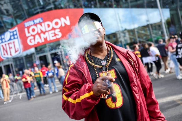 4th October 2026; Tottenham Hotspur Stadium, London, England; NFL, American Football Herren, USA International Series American Football, Washington Commanders versus Indianapolis Colts; a fan poses for a photo outside of the stadium HenningxVonxJagow