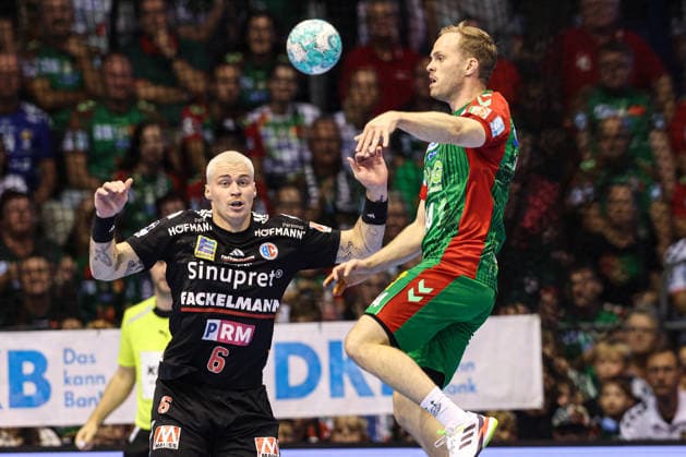 Omar Ingi Magnusson (SC Magdeburg, 14) vs. Marek Nissen (HC Erlangen, 6) – Handball Bundesliga, 2026–2027 season: SC Magdeburg vs. HC Erlangen at the GETEC Arena in Magdeburg. Action, handball, Germany, October 4, 2026