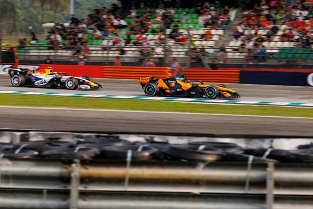 4th October 2026; Sepang IC, Kuala Lumpur, Malaysia; Formula 1, Bahrain Grand Prix, Race Day; Scuderia Ferrari HP driver Charles Leclerc of Monaco, Visa Cash App Racing Bulls Formula One Team driver Liam Lawson of New Zealand during the race StephenxBlackberry