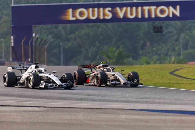 4th October 2026; Sepang IC, Kuala Lumpur, Malaysia; Formula 1, Bahrain Grand Prix, Race Day; Cadillac Formula 1 Team driver Sergio Perez of Mexico, Audi Revolut F1 Team driver Gabriel Bortoleto of Brazil during the race StephenxBlackberry