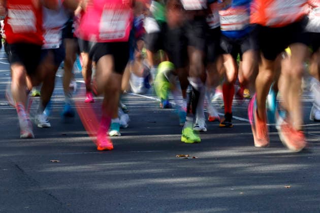Participants in the 28th Generali Cologne Marathon 2026 run through downtown Cologne. Numerous spectators cheer on the runners with homemade signs. Thematic photo, symbolic image. Cologne, October 4, 2026. North Rhine-Westphalia, Germany Copyright: xChristophxHardtx