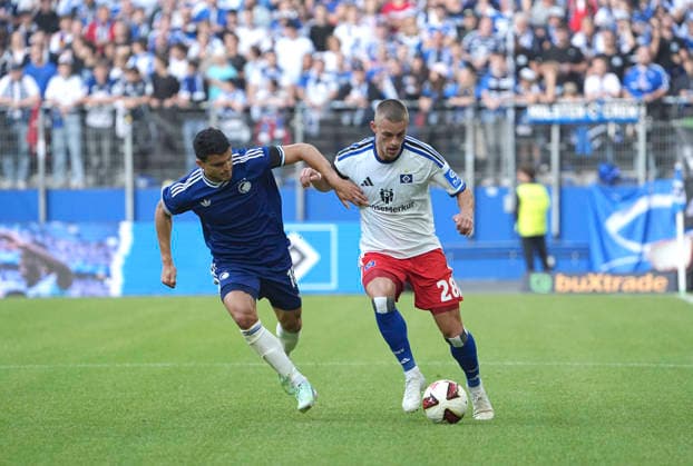 Photo: Miro MUHEIM, HSV vs. Mohamed ELYOUNOUSSI, left; Bundesliga soccer; friendly match on Sunday, October 4, 2026; Hamburger SV vs. FC Copenhagen