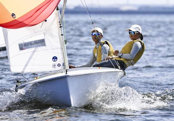 Aichi-Nagoya Asian Games: Sailing Japanese sailors Riho Sanematsu (R) and Misaki Tsunomori compete en route to winning the Aichi-Nagoya Asian Games youth mixed dinghy gold off Kaiyoh Yacht Harbor in Gamagori in Aichi Prefecture, central Japan, on Oct. 3, 2026.  A14AA0005630113P