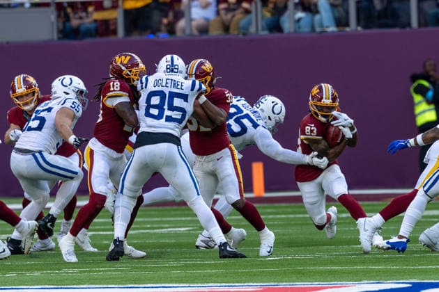 95 Adetomiwa Adebawore (DT) Indianapolis Colts run to the tackle from 83 Jaylin Lane (WR) Washington Commanders Indianapolis Colts vs Washington Commanders, American Football, NFL, American Football Herren, USA Week 4, 2026, 04.10.2026 Tottenham Tottenham Hotspur Stadium Vereinigtes Königreich Copyright: xPFA ThomasxMummertx