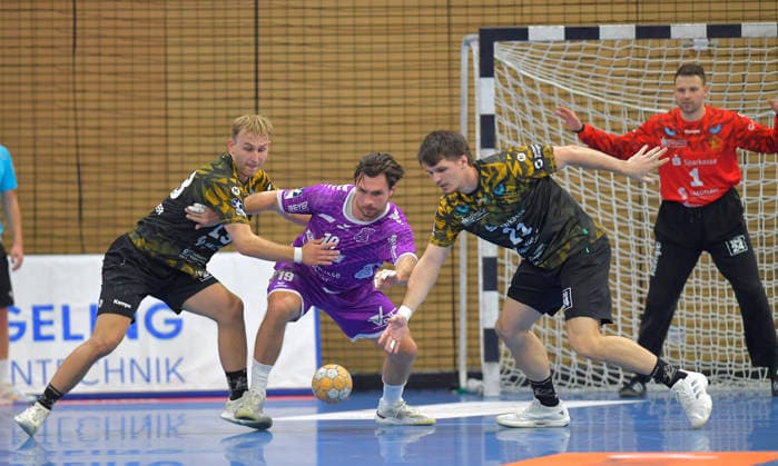 October 4, 2026, Dresden s Anton Preußner (LKS) and Dresden s Ediz Aktas vs. Hüttenberg s Vit Reichl, handball, 2nd Bundesliga, HC Elbflorenz Dresden vs. TV Hüttenberg, c Dresden