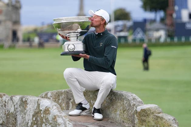 RECORD DATE NOT STATED 4th October 2026; Old Course at St Andrews, St Andrews, Scotland; DP World Tour Golf, Alfred Dunhill Links Championship, Final Day; Adrian Meronk kisses the Alfred Dunhill trophy on the Swilcan Bridge after winning the tournament and becoming champion golfer AlecxBrown