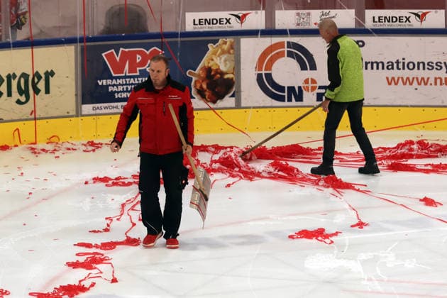 Sahnpark Crimmitschau, October 4, 2026; 2026–27 Season; Ice Hockey; 2nd Bundesliga; Regular Season; Game 6; Saxony Ice Arena; Saxony Derby; Eispiraten vs. Lausitzer Füchse; Fans help organize the players’ entrance before the game; The paper on the ice causes significant game delays. The ice technicians clear the paper from the ice. Crimmitschau, Saxony, Germany