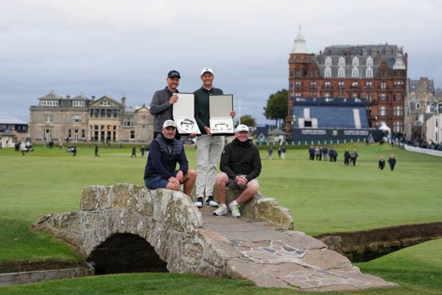 RECORD DATE NOT STATED 4th October 2026; Old Course at St Andrews, St Andrews, Scotland; DP World Tour Golf, Alfred Dunhill Links Championship, Final Day; Tom Chaplin, Adrian Meronk and their caddies hold the team championship trophy on the Swilcan Bridge AlecxBrown