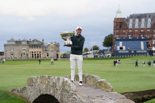 RECORD DATE NOT STATED 4th October 2026; Old Course at St Andrews, St Andrews, Scotland; DP World Tour Golf, Alfred Dunhill Links Championship, Final Day; Adrian Meronk lifts the Alfred Dunhill trophy on the Swilcan Bridge after winning the tournament and becoming champion golfer AlecxBrown