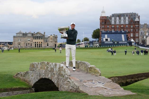 RECORD DATE NOT STATED 4th October 2026; Old Course at St Andrews, St Andrews, Scotland; DP World Tour Golf, Alfred Dunhill Links Championship, Final Day; Adrian Meronk lifts the Alfred Dunhill trophy on the Swilcan Bridge after winning the tournament and becoming champion golfer AlecxBrown