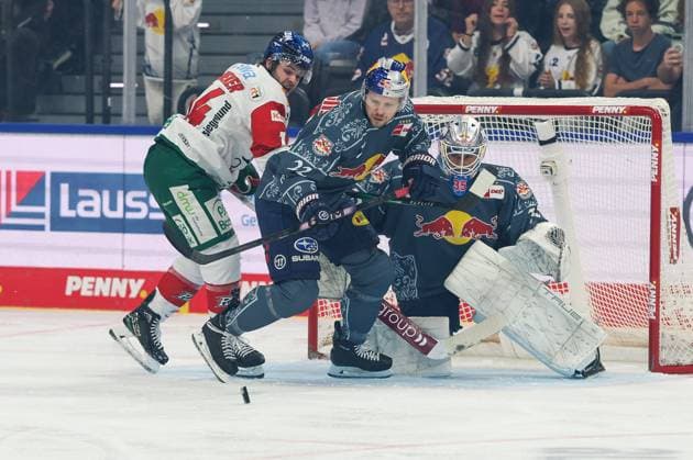 One-on-one, action, featuring D. J. Busdeker 14 (Augsburger Panther), Ville Pokka 22 (EHC Red Bull Munich), Mathias Niederberger 35 (EHC Red Bull Munich), EHC Red Bull Munich vs. Augsburger Panther, Matchday 6, Ice Hockey, Penny DEL, Oct. 3, 2026, Munich, Bavaria, Germany Copyright: xkolbert-press ChristianxKolbertx