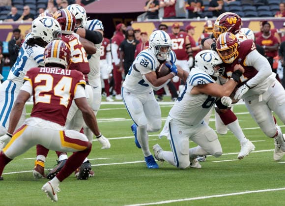 Indianapolis Colts Running Back Jonathan Taylor runs with the football in their match against the Washington Commanders at Tottenham stadium in London on Sunday October 04, 2026. Colts beat the Commanders 30-13.  LON2026100411 HUGOxPHILPOTT