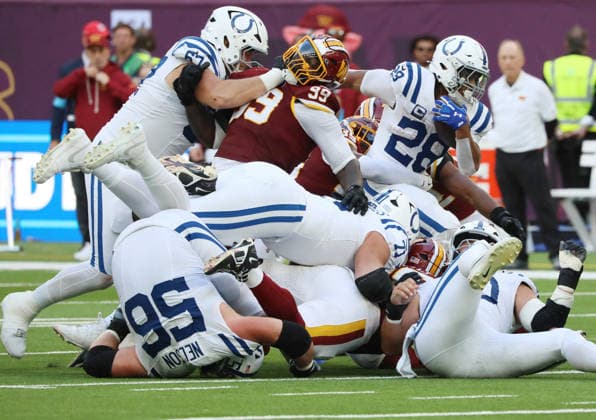 Indianapolis Colts Running Back Jonathan Taylor runs with the football in their match against the Washington Commanders at Tottenham stadium in London on Sunday October 04, 2026. Colts beat the Commanders 30-13.  LON2026100425 HUGOxPHILPOTT