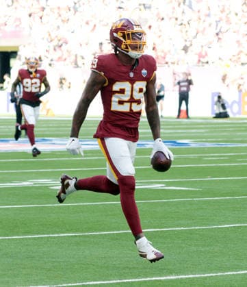 Washington Commanders Nick Cross celebrates an interception in their match against the Indianapolis Colts at Tottenham stadium in London on Sunday October 04, 2026. Colts beat the Commanders 30-13.  LON2026100406 HUGOxPHILPOTT