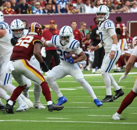 Indianapolis Colts Running Back Jonathan Taylor runs with the football in their match against the Washington Commanders at Tottenham stadium in London on Sunday October 04, 2026. Colts beat the Commanders 30-13.  LON2026100407 HUGOxPHILPOTT