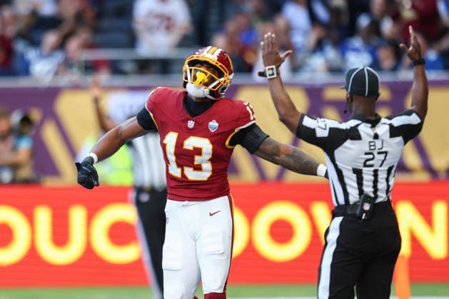 October 4, 2026, London, England, United Kingdom: TREYLON BURKS 13 of Washington Commanders celebrates scoring a touchdown after a 47 yards pass from Athan Kaliakmanis in the NFL, American Football Herren, USA 2026 27 regular season game week 4 between INDIANAPOLIS COLTS and WASHINGTON COMMANDERS at the Tottenham Hotspur Stadium in London, United Kingdom. Colts won 30:13 against Commanders. NFL 2026: Colts 30:13 Commanders  - ZUMAc179 20261004_zep_c179_073 Copyright: xMickaelxChavetx