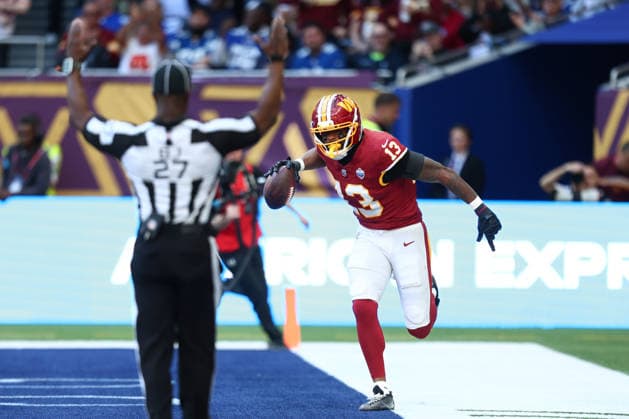 October 4, 2026, London, England, United Kingdom: TREYLON BURKS 13 of Washington Commanders celebrates scoring a touchdown after a 47 yards pass from Athan Kaliakmanis in the NFL, American Football Herren, USA 2026 27 regular season game week 4 between INDIANAPOLIS COLTS and WASHINGTON COMMANDERS at the Tottenham Hotspur Stadium in London, United Kingdom. Colts won 30:13 against Commanders. London United Kingdom - ZUMAc179 20261004_zep_c179_068 Copyright: xMickaelxChavetx