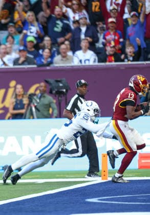 October 4, 2026, London, England, United Kingdom: TREYLON BURKS 13 of Washington Commanders scores a touchdown after a 47 yards pass from Athan Kaliakmanis in the NFL, American Football Herren, USA 2026 27 regular season game week 4 between INDIANAPOLIS COLTS and WASHINGTON COMMANDERS at the Tottenham Hotspur Stadium in London, United Kingdom. Colts won 30:13 against Commanders. London United Kingdom - ZUMAc179 20261004_zep_c179_071 Copyright: xMickaelxChavetx