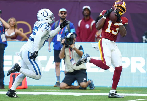 October 4, 2026, London, England, United Kingdom: TREYLON BURKS 13 of Washington Commanders catches a 47 yards pass from Athan Kaliakmanis in the NFL, American Football Herren, USA 2026 27 regular season game week 4 between INDIANAPOLIS COLTS and WASHINGTON COMMANDERS at the Tottenham Hotspur Stadium in London, United Kingdom. Colts won 30:13 against Commanders. London United Kingdom - ZUMAc179 20261004_zep_c179_078 Copyright: xMickaelxChavetx