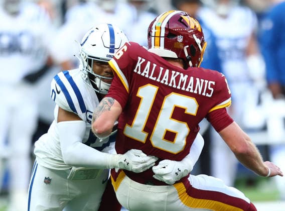 October 4, 2026, London, England, United Kingdom: Quarterback ATHAN KALIAKMANIS of Washington Commanders is sacked in the NFL, American Football Herren, USA 2026 27 regular season game week 4 between INDIANAPOLIS COLTS and WASHINGTON COMMANDERS at the Tottenham Hotspur Stadium in London, United Kingdom. Colts won 30:13 against Commanders. NFL 2026: Colts 30:13 Commanders  - ZUMAc179 20261004_zep_c179_122 Copyright: xMickaelxChavetx