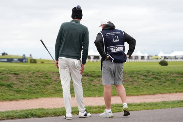 RECORD DATE NOT STATED 4th October 2026; Old Course at St Andrews, St Andrews, Scotland; DP World Tour Golf, Alfred Dunhill Links Championship, Final Day; Adrian Meronk and his caddie Stuart Beck remain focused before chipping onto the 17th green AlecxBrown