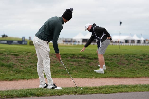 RECORD DATE NOT STATED 4th October 2026; Old Course at St Andrews, St Andrews, Scotland; DP World Tour Golf, Alfred Dunhill Links Championship, Final Day; Adrian Meronk and his caddie Stuart Beck remain focused before chipping onto the 17th green AlecxBrown