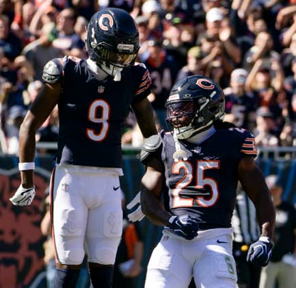 Chicago Bears running back Kyle Monangai (25) celebrates his first quarter touchdown against the New York Jets with Jahdae Walker (9) at Soldier Field in Chicago on Sunday, October 4, 2026. CHI20261004104 MARKxBLACK