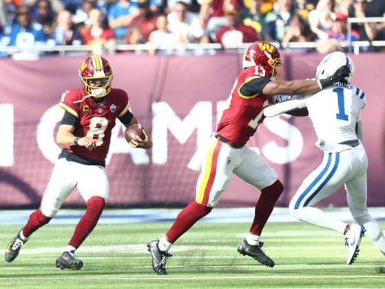 October 4, 2026, London, England, United Kingdom: Quarterback MARCUS MARIOTA 8 of Washington Commanders runs with the ball in the NFL, American Football Herren, USA 2026 27 regular season game week 4 between INDIANAPOLIS COLTS and WASHINGTON COMMANDERS at the Tottenham Hotspur Stadium in London, United Kingdom. Colts won 30:13 against Commanders. London United Kingdom - ZUMAc179 20261004_zep_c179_154 Copyright: xMickaelxChavetx