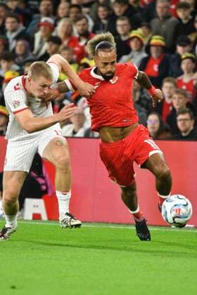 Football - 2026 2027 UEFA Nations League - League A, Group Four: Wales vs. Denmark - Cardiff City Stadium - Sunday 4th October 2026 Sorba Thomas WALES challenged by Adam Daghim DENMARK colorsport winston bynorth 