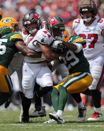 Oct 4, 2026; Tampa, FL, USA; Tampa Bay Buccaneers running back Sean Tucker (44) fights for a first down on a 4th & 1 during the NFL, American Football Herren, USA game between the Green Bay Packers and Tampa Bay Buccaneers at Raymond James Stadium. Mandatory Credit: Taylor McFee-Cal Media Tampa USA - ZUMAc04_ 20261004_zma_c04_068 Copyright: xTaylorxMcfeex